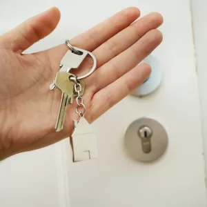 Person handing over keys
